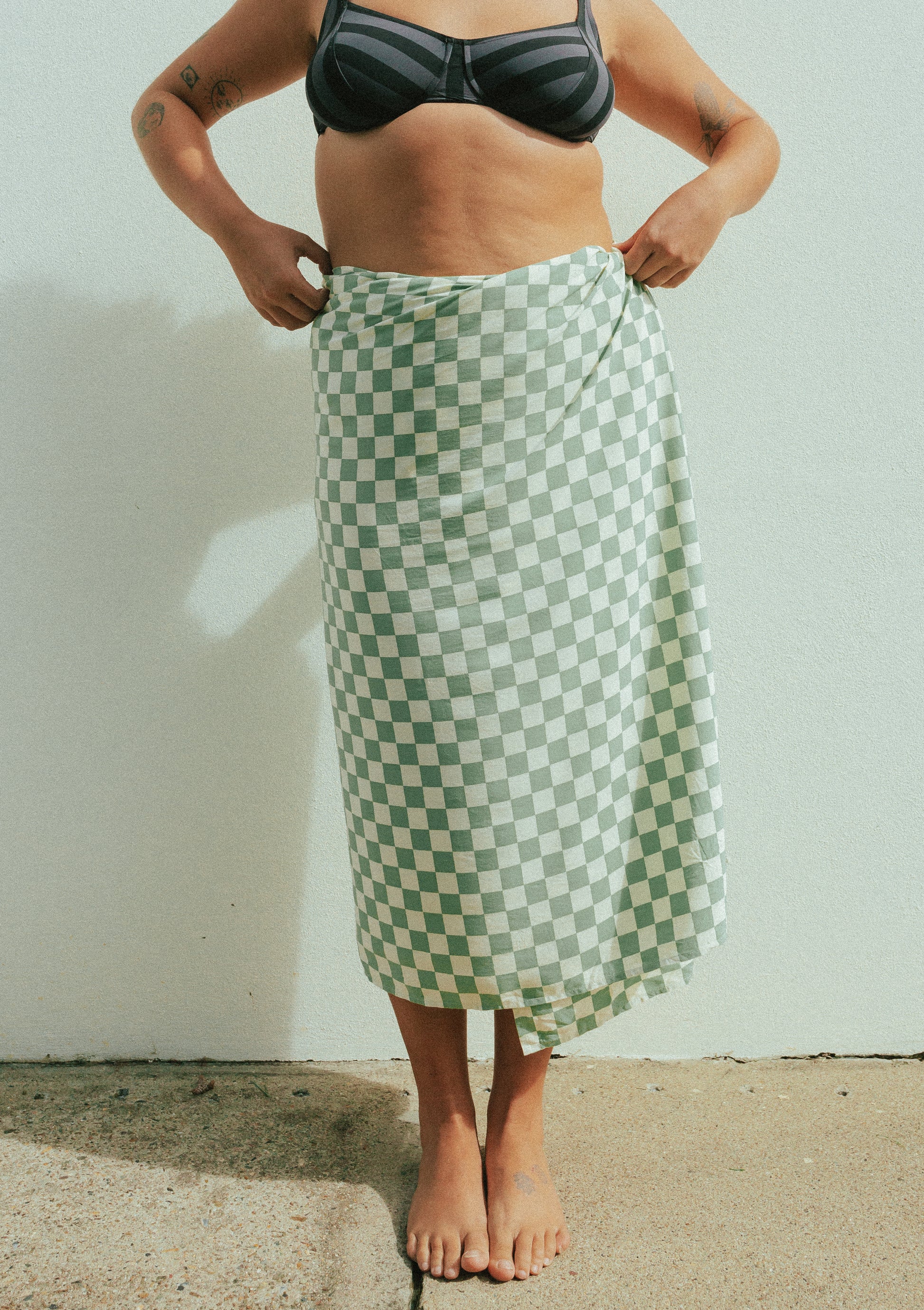 checkered white and green sarong